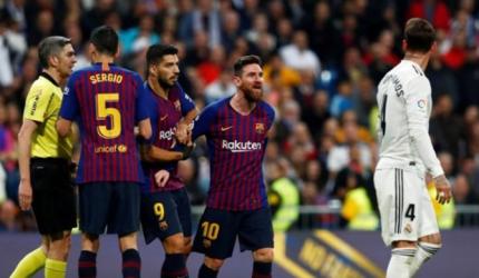 Barca hailed as champions-elect after beating Madrid