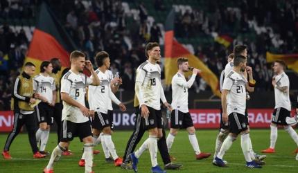 New-look Germany show promise in draw with Serbia; Wales win