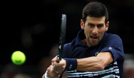 Djokovic sees off Edmund; Barty in WTA Finals semis