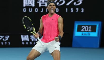 Nadal rides out Kyrgios challenge to reach quarters