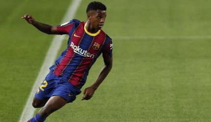 Barcelona's Fati out for four months after surgery