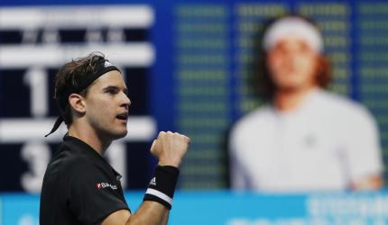 Thiem edges Tsitsipas in ATP Finals opener