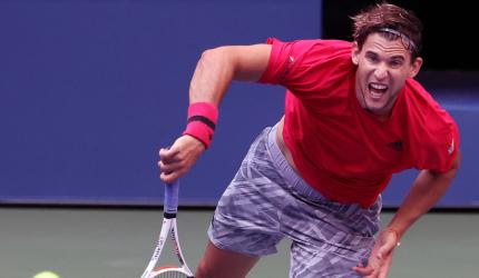 PHOTOS: Thiem, Medvedev storm into quarters