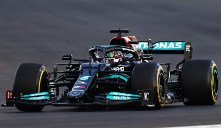 Race was 'manipulated', Hamilton told team on radio