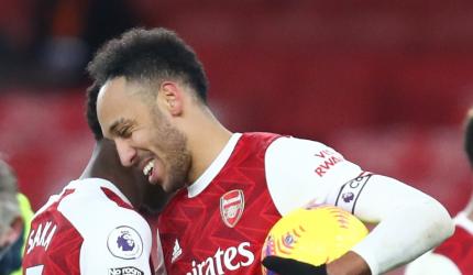 PICS: Aubameyang 'tricks' in Arsenal win; Man Utd held