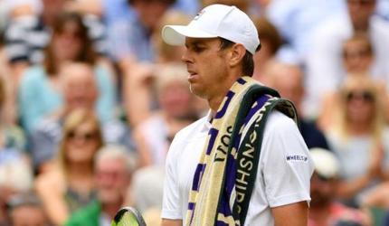 Querrey defends escape from Russia