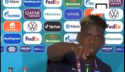 Pogba removes Heineken bottle at Euro news conference