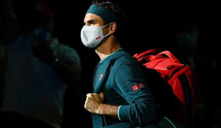 Federer returns after 14 months, no ice bath for champ