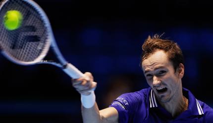 Tennis: Medvedev fights back to sink Hurkacz