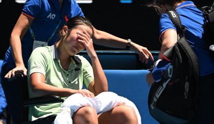 Heartbreak for Tan as she exits Aus Open on wheelchair