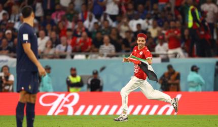 FIFA WC: Man invades pitch with Palestinian flag