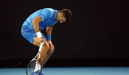 Hamstrung Djokovic taking it one day at a time