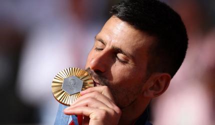 Novak Djokovic claims historic Olympic gold