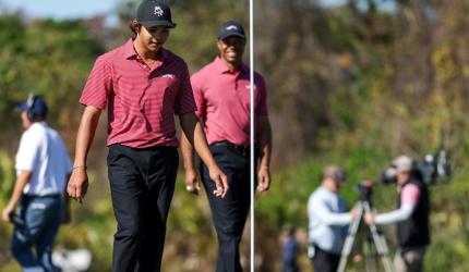 Tiger Wood in awe as son Charlie leads the way