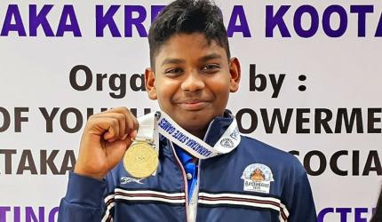 Jonathan, 15, stuns Olympic medallist to win gold