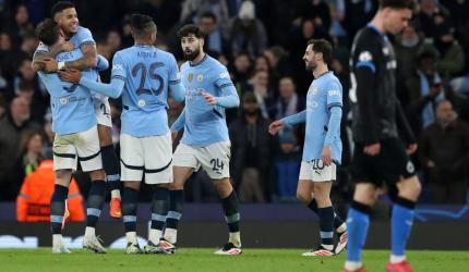 CL PIX: Man City survive scare, Real storm through