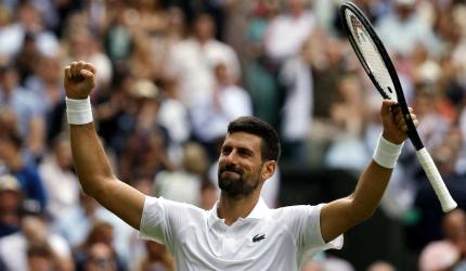 PIX: Djokovic grinds past Di Minaur; Mirra advances