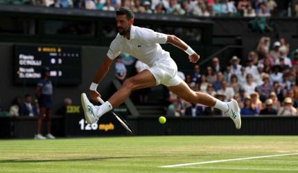 PIX: Djokovic downs Cobolli; Sinner tames Shelton
