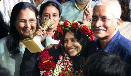 Divya honours childhood coach with touching gesture