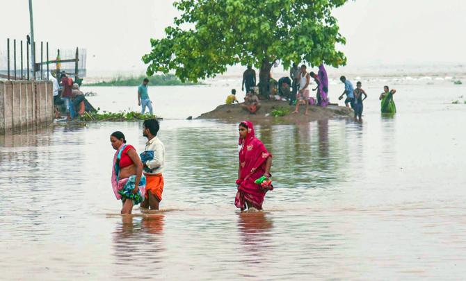 Heavy Rain Swells Ganga To Warning Levels