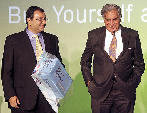 Tata Group Chairman Ratan Tata (R) and Deputy Chairman Cyrus Mistry attend the launch of a new website for tech superstore Croma, managed by Infiniti Retail.