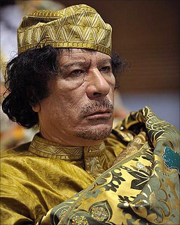 Muammar Gaddafi.