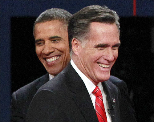 President Barack Obama (L) and Republican presidential nominee Mitt Romney share a laugh at the end of the first presidential debate in Denver.