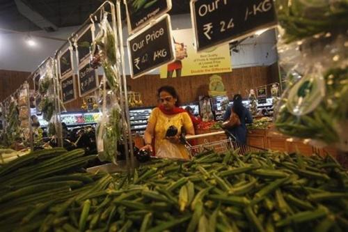 Customers shop inside a HyperCity supermarket in Mumbai.