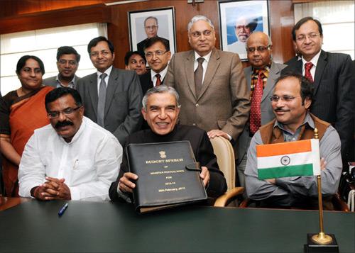 Union Railway Minister Pawan Kumar Bansal with Ministers of State for Railways, K.J. Surya Prakash Reddy and Adhir Ranjan Chowdhury and the Chairman, Railway Board, Vinay Mittal.