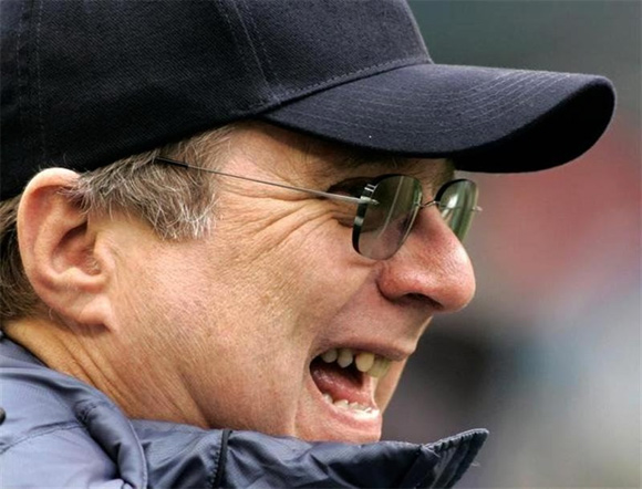 Seattle Seahawks owner Paul Allen enjoys a laugh while out on the field before the start of his NFC playoff game against the Washington Redskins in Seattle, Washington.