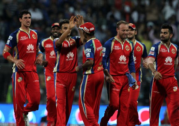 Harshal Patel celebrates after dismissing Ben Dunk