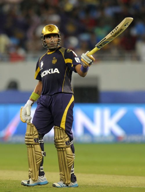 Robin Uthappa reacts after reaching his half-century 