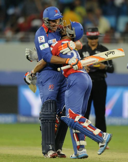 JP Duminy and Nathan Coulter-Nile celebrates after winning the game 