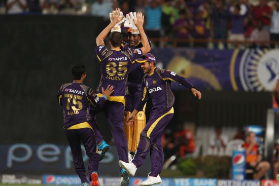 Kolkata Knight Riders players celebrate after picking up a wicket