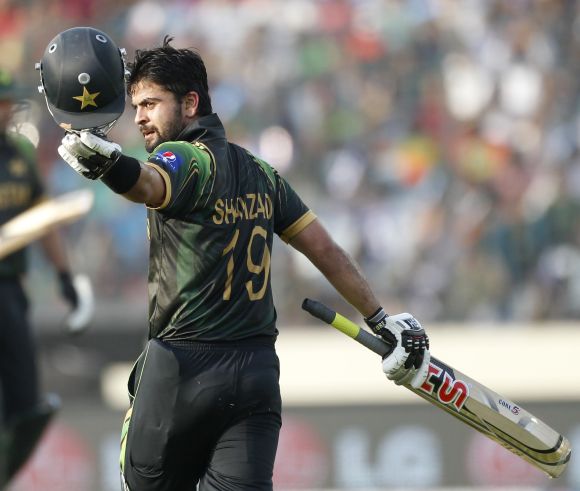 Ahmed Shehzad celebrates after reaching his century
