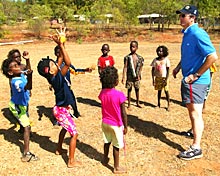 Steve Waugh playing with kids on the remote Tiwi Islands north of Darwin