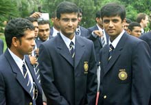 Indian captain Sourav Ganguly (M) stands with team mates Rahul Dravid (R) and Sachin Tendulkar before departing for Australia from Chennai