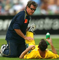 Errol Alcott treating an Australian player