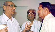 G S Ramchand (centre) with Polly Umrigar (left) and Chandu Borde at a function.