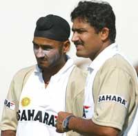 Harbhajan Singh with Anil Kumble (right)