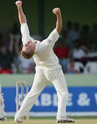 Andrew Flintoff celebrates after taking his fifth wicket