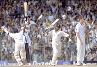 22 Mar 2001: Sameer Dighe (left) and Harbhajan Singh celebrate as they complete the winning runs during the third Test at the Chidambaram Stadium in Chepauk, Chennai, India. India won the game by two wickets to win the three-Test series 2-1.