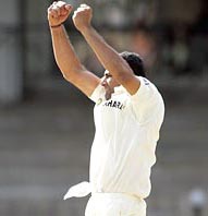 Anil Kumble celebrates after taking his 400th Test wicket