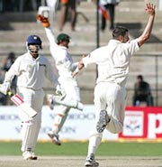 Sourav Ganguly is caught behind off Michael Kasprowicz's bowling in the first innings of the first Test at Bangalore