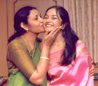 Madhi Malar with her mother
