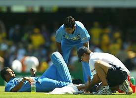 Andrew Leipus treats Sachin Tendulkar on the field