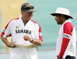 John Wright (left) with Virender Sehwag