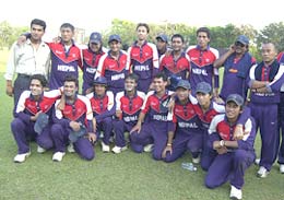 The victorious Nepal team poses after their two-run win over South Africa in the Plate Championship semi-final.