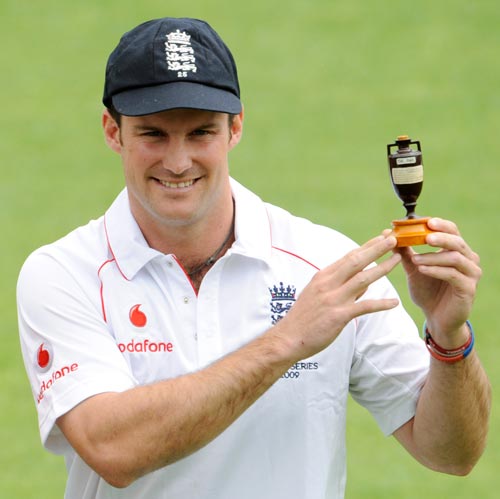 England captain Andrew Strauss holds a replica of the Ashes urn before the first Ashes Test against Australia at Cardiff, Wales