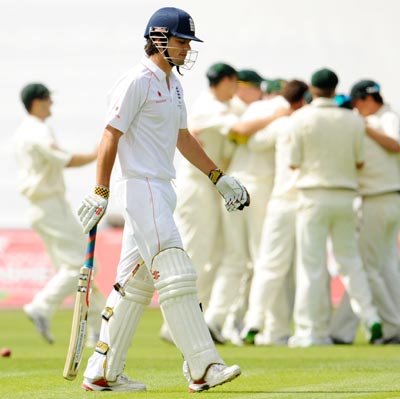 England's Alastair Cook leaves the field after his dismissal during the Ashes Test match